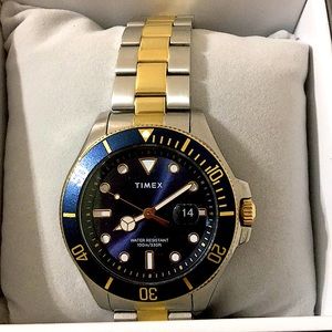 Man Timex watch ,stainless steel,glass scratch resistant,day date automatic